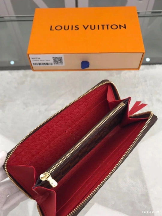 First bag VUITTON ZIPPY LOUIS 0717